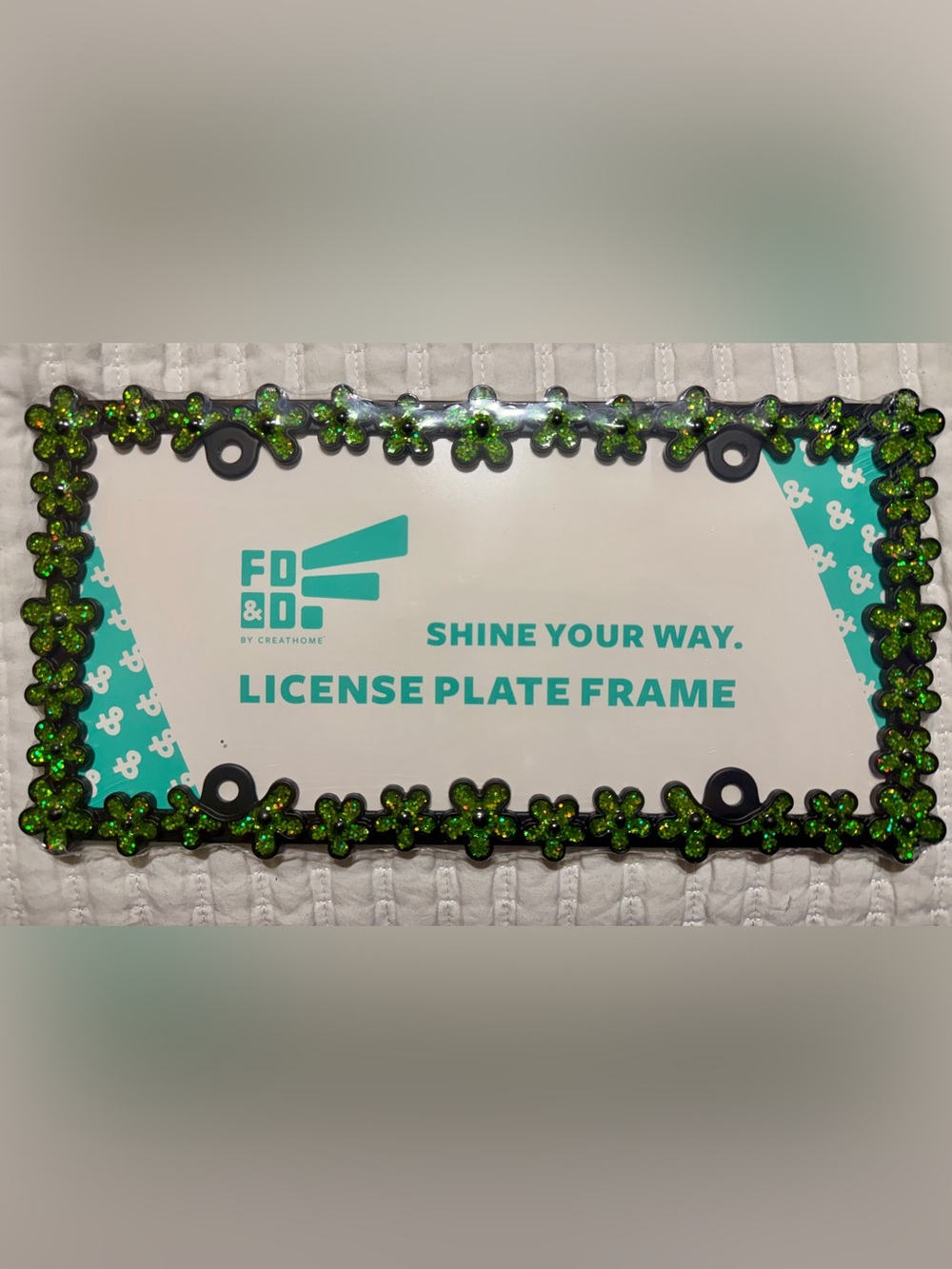 Green flower license plate frame